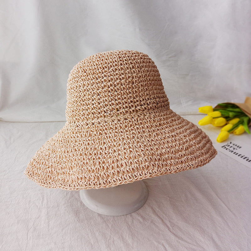 Women's retro flat brim summer hat styled with a casual outfit outdoors