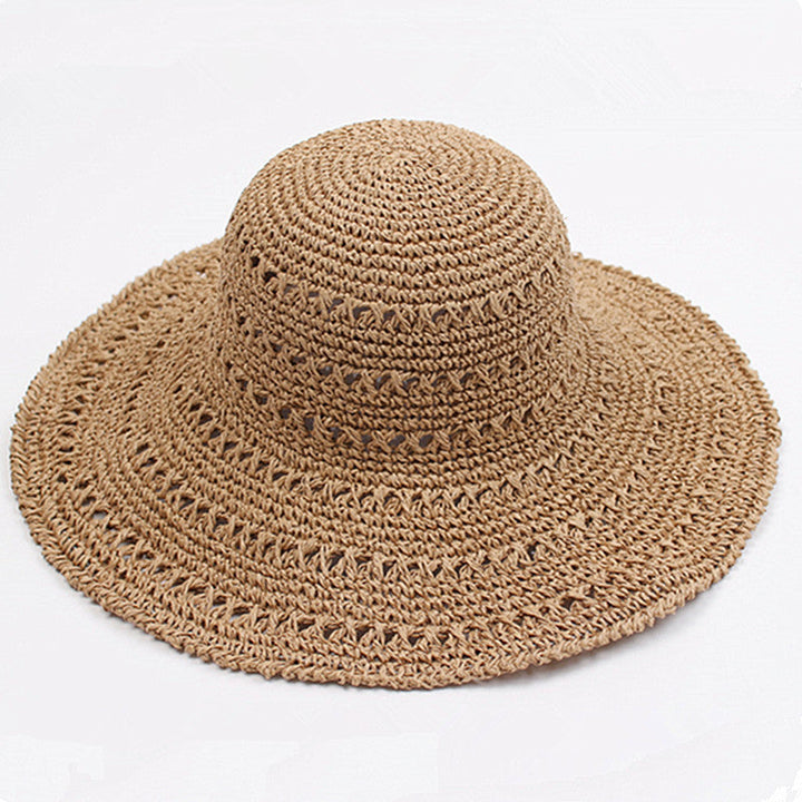 Back view of the foldable travel hat for women showing its flat brim design