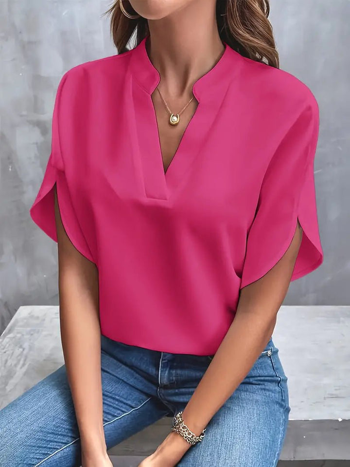 Back view showing relaxed fit and soft fabric of summer blouse