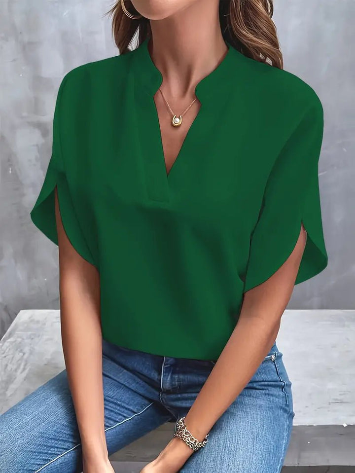 Flat lay of versatile summer top paired with accessories