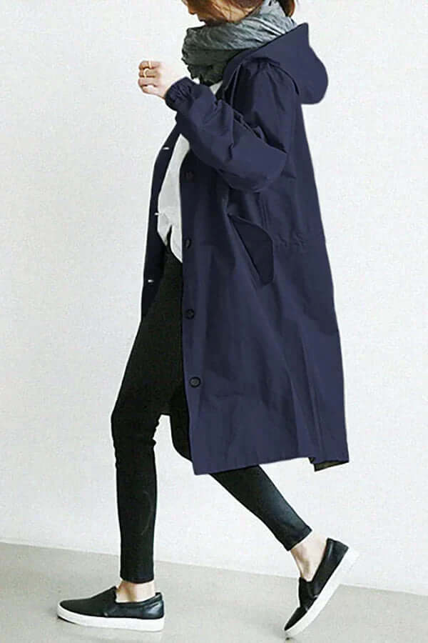 Womens waterproof rain cape folded neatly for travel and outdoor wear