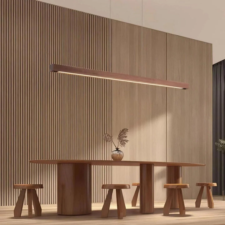 Interior lighting view of the minimalist linear wood lamp suspended
