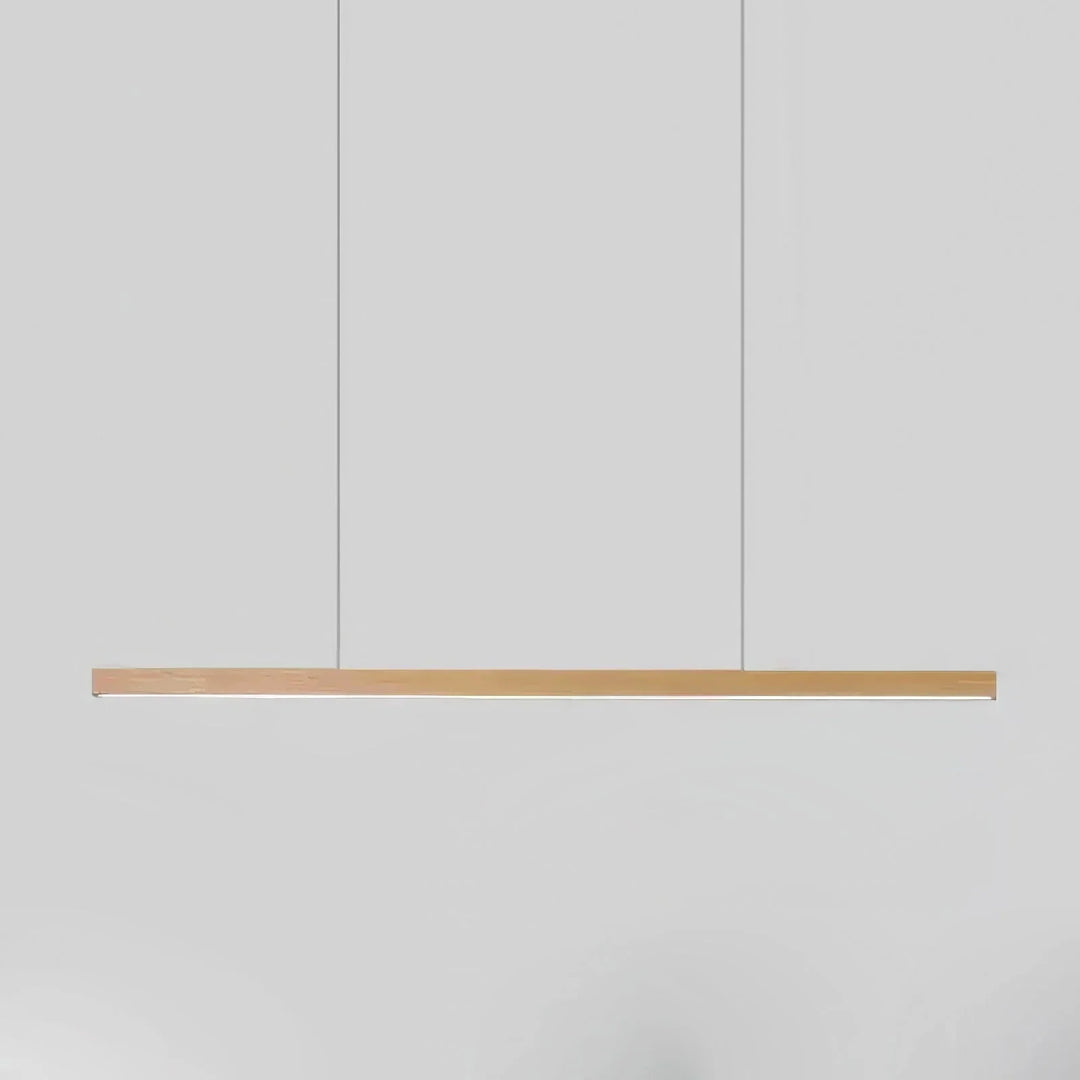 Natural wood linear LED pendant light suspended with thin steel cables