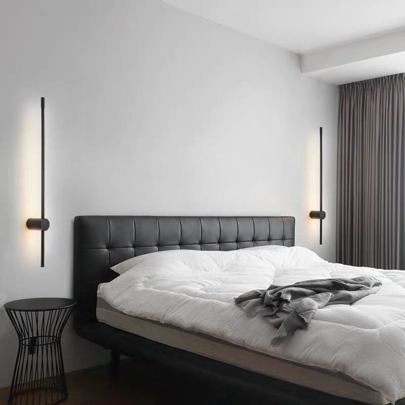 Stylish iron light LED wall sconce highlighting modern architectural interior design