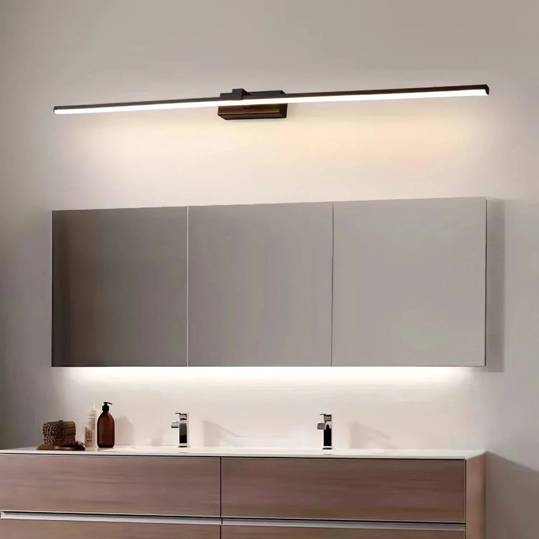Modern LED linear wall light providing bright accent lighting for bathroom mirrors and vanities.