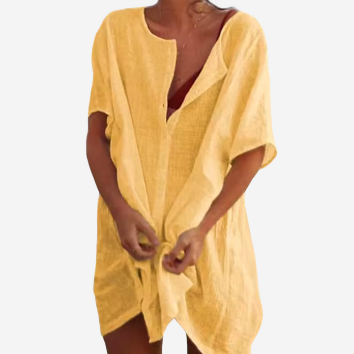 Close up view of lightweight fabric and relaxed fit on a summer beach tunic