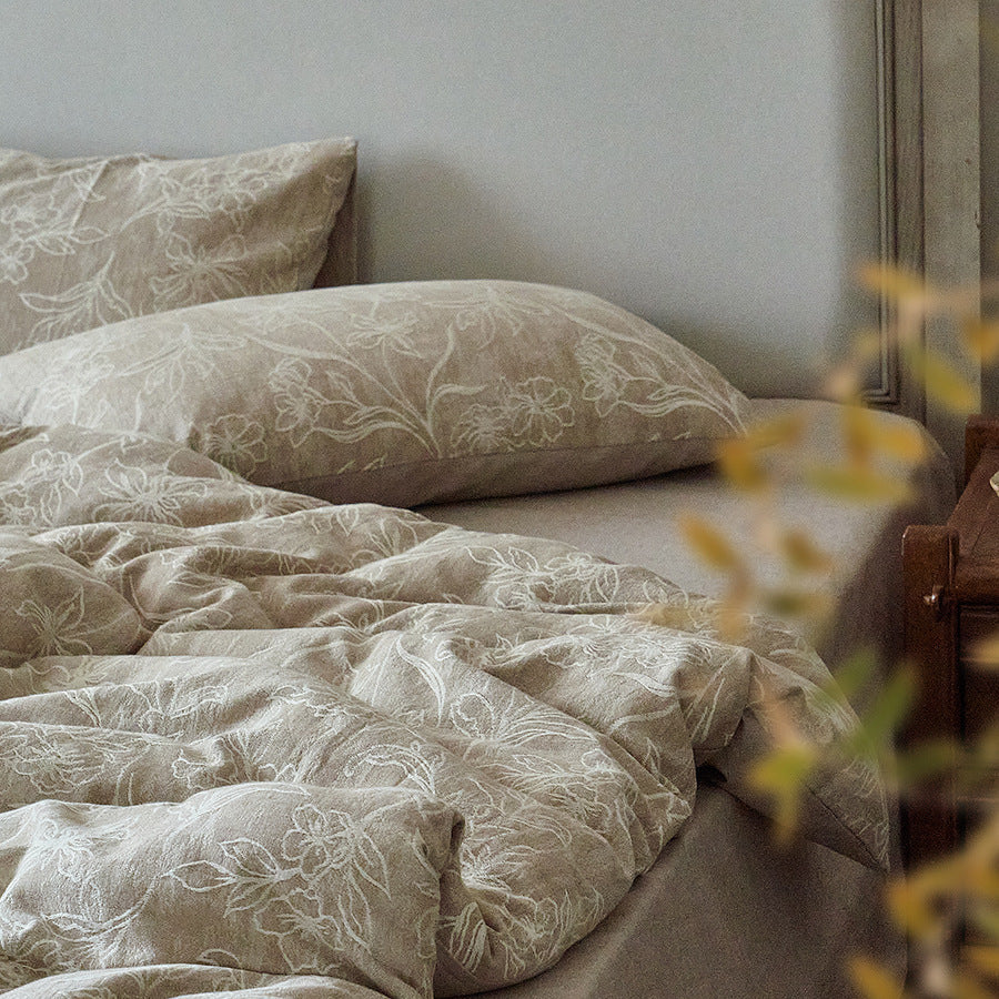 Luxury floral jacquard bedding set styled neatly on a modern bed