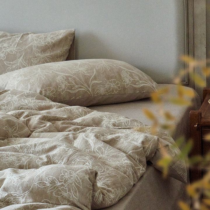 Luxury floral jacquard bedding set styled neatly on a modern bed