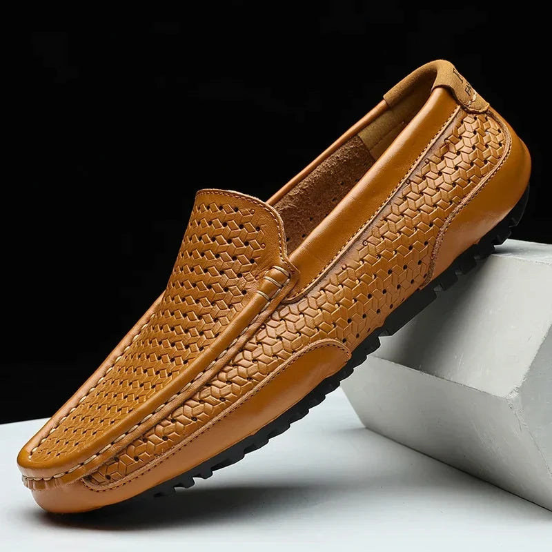 Yellow brown woven men's loafer shoe on display