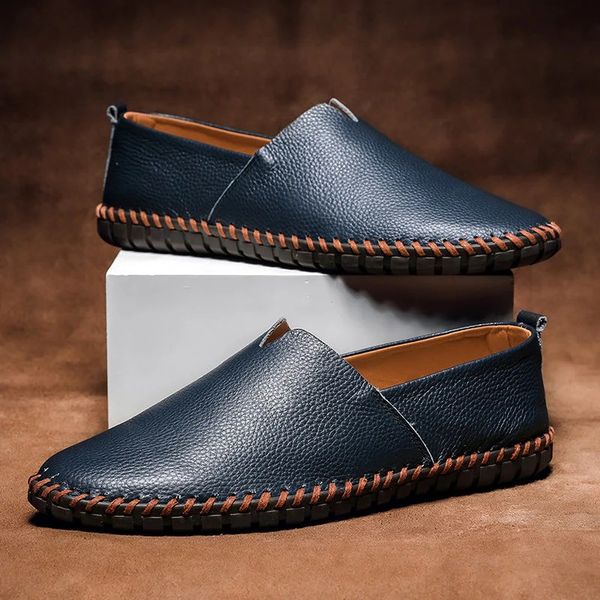 Men's navy slip-on loafers with contrasting hand-stitched details