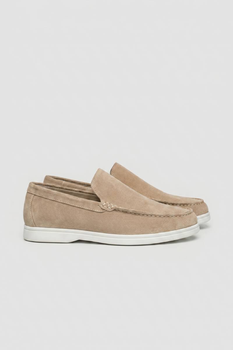 Beige men's slip-on loafers with white sole viewed from the side