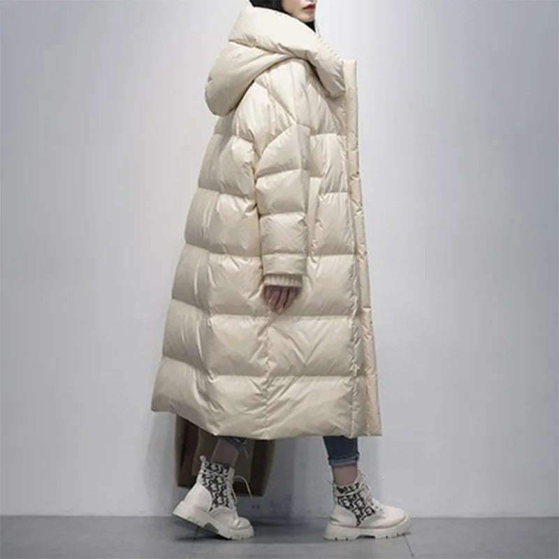 Warm quilted winter jacket with long coverage for women