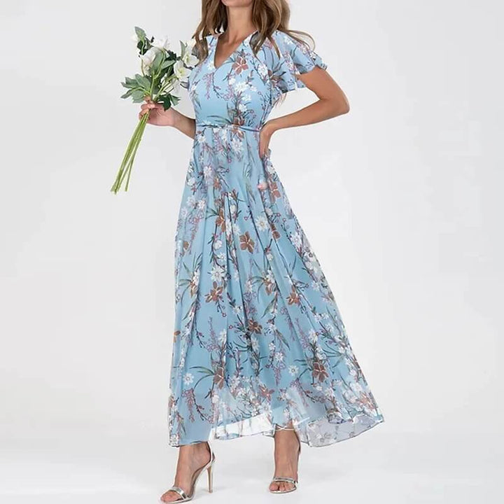 Women's floral long summer dress shown from the back, casual vacation wear