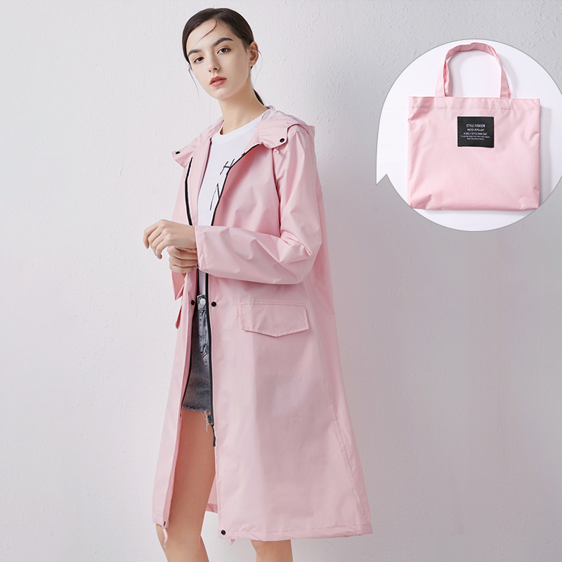 Womens fashion rain jacket folded neatly to demonstrate packable travel design