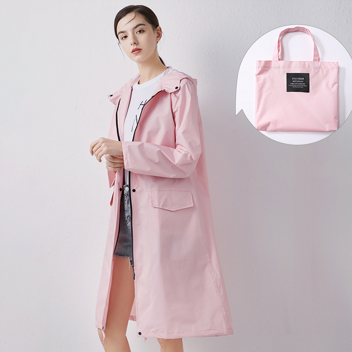 Womens fashion rain jacket folded neatly to demonstrate packable travel design