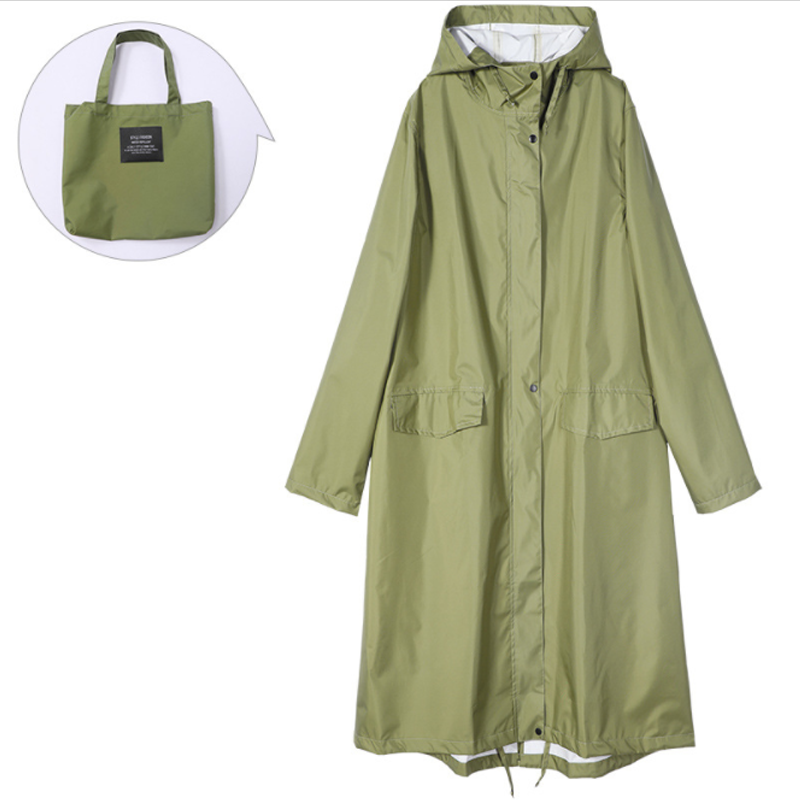 Womens long waterproof hooded raincoat showing front full length view in outdoor setting
