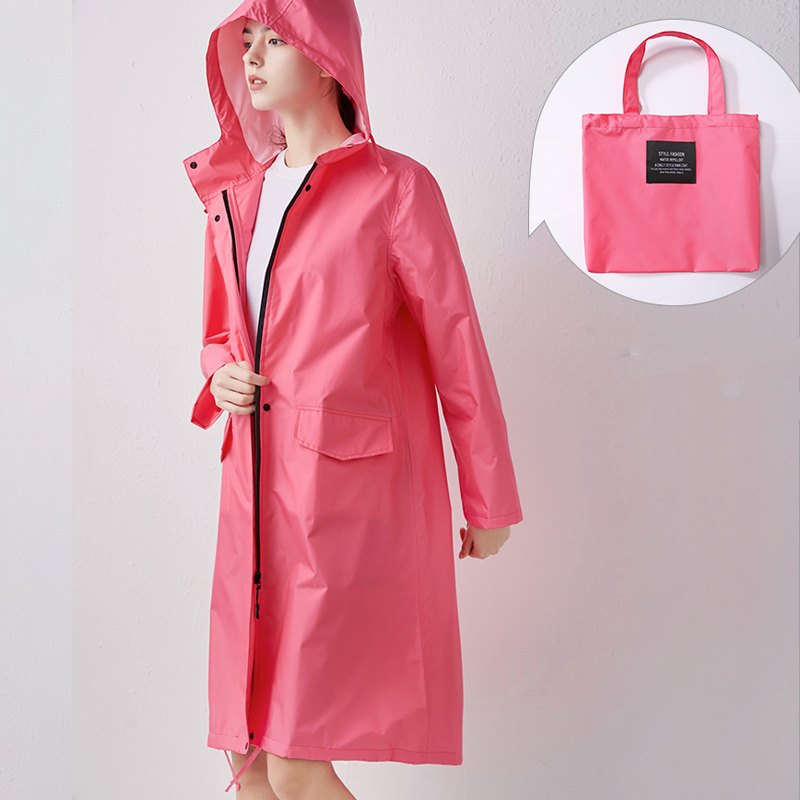 Womens long rain jacket featuring deep hood and secure front zipper closure