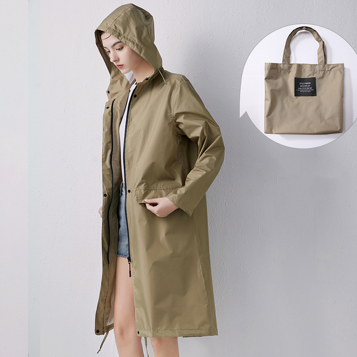Detailed view of deep pockets and waterproof zipper on womens long coat
