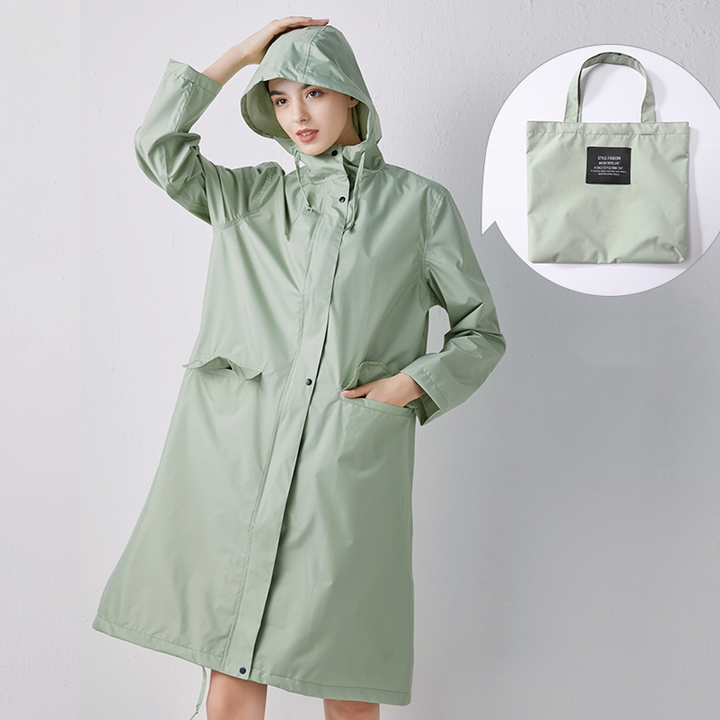 Back view of womens hooded waterproof raincoat designed for outdoor travel gear