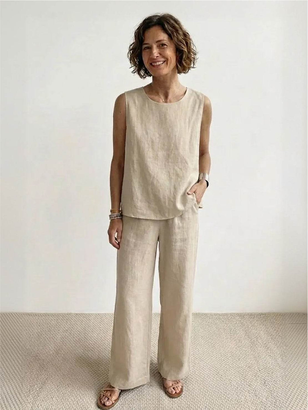 Solid color sleeveless top paired with comfortable wide leg pants for women
