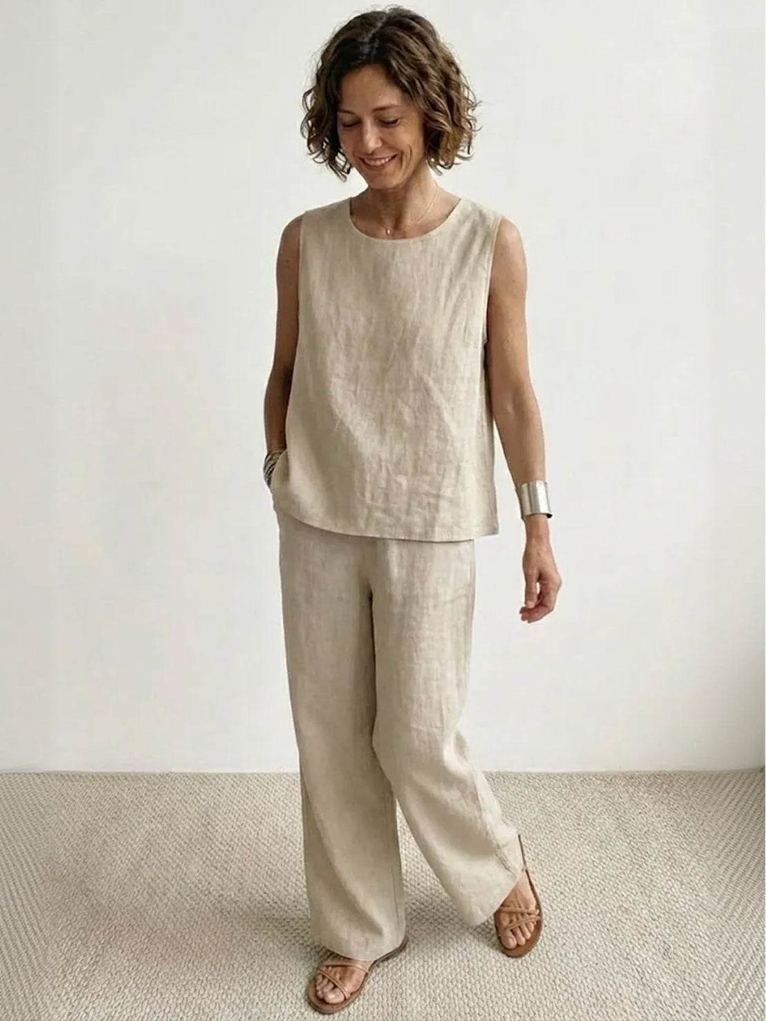 Stylish two-piece summer outfit with a minimalist sleeveless top and pants