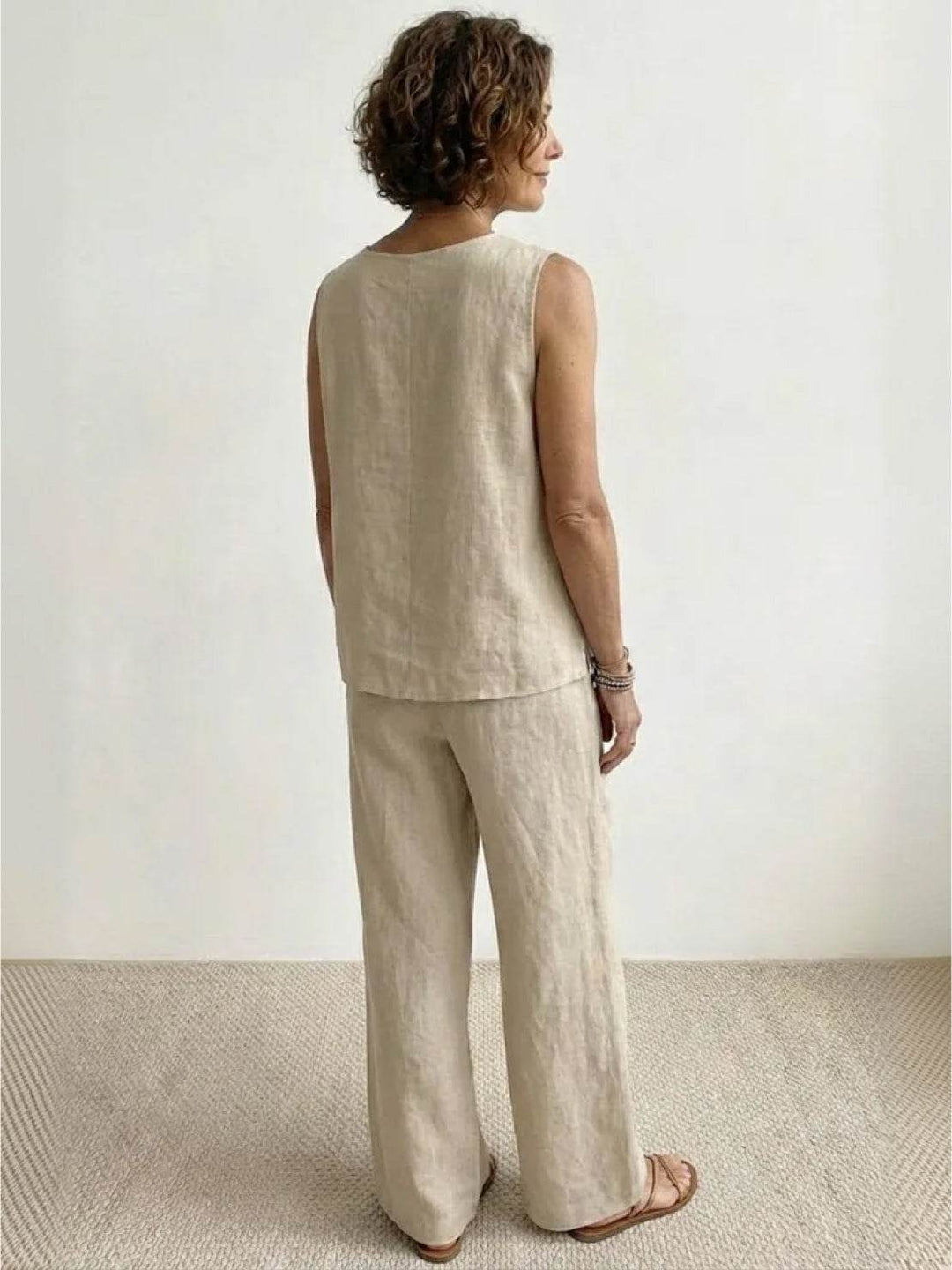 Breathable women's sleeveless top and wide leg trousers set for warm weather