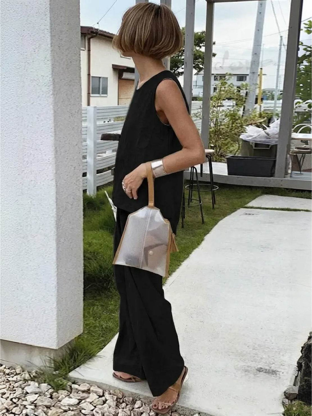Modern summer style featuring a sleeveless top and high-waist wide leg pants