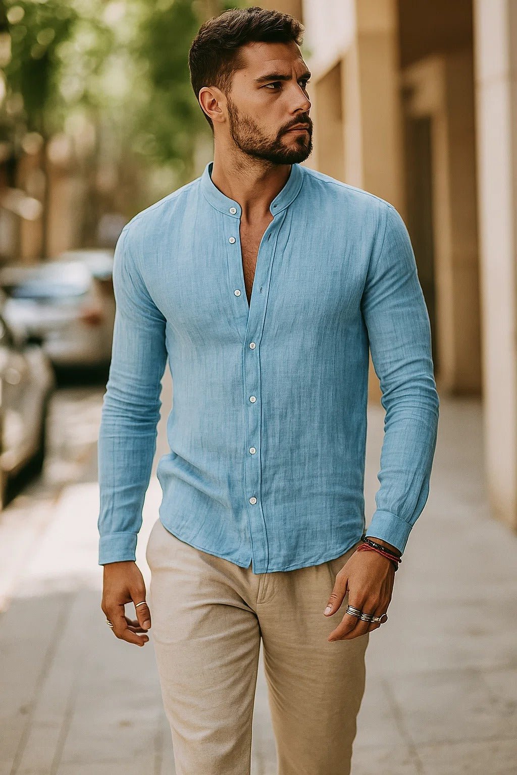 Detailed shot of adjustable button cuffs on mens solid color shirt