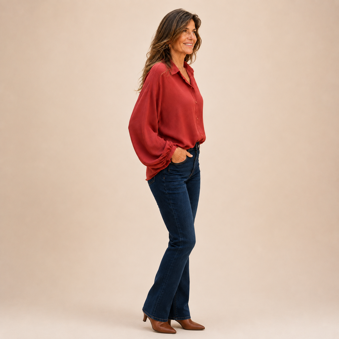 Womens versatile casual top designed as a relaxed fit button down blouse