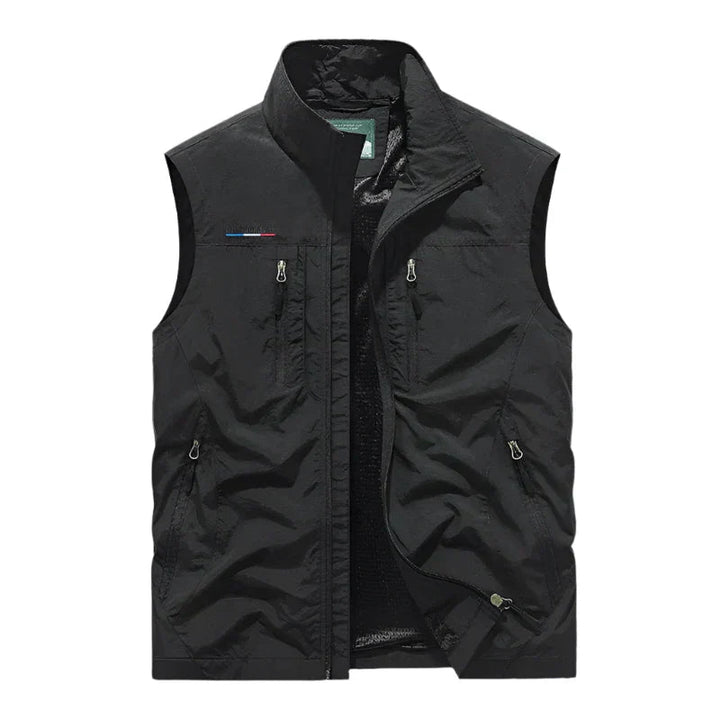 Men's black full zip outdoor vest displayed flat against a clean background