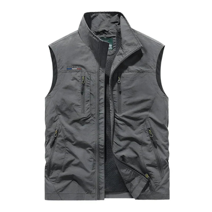 Men's gray full zip outdoor vest showcasing the sleeveless hiking design