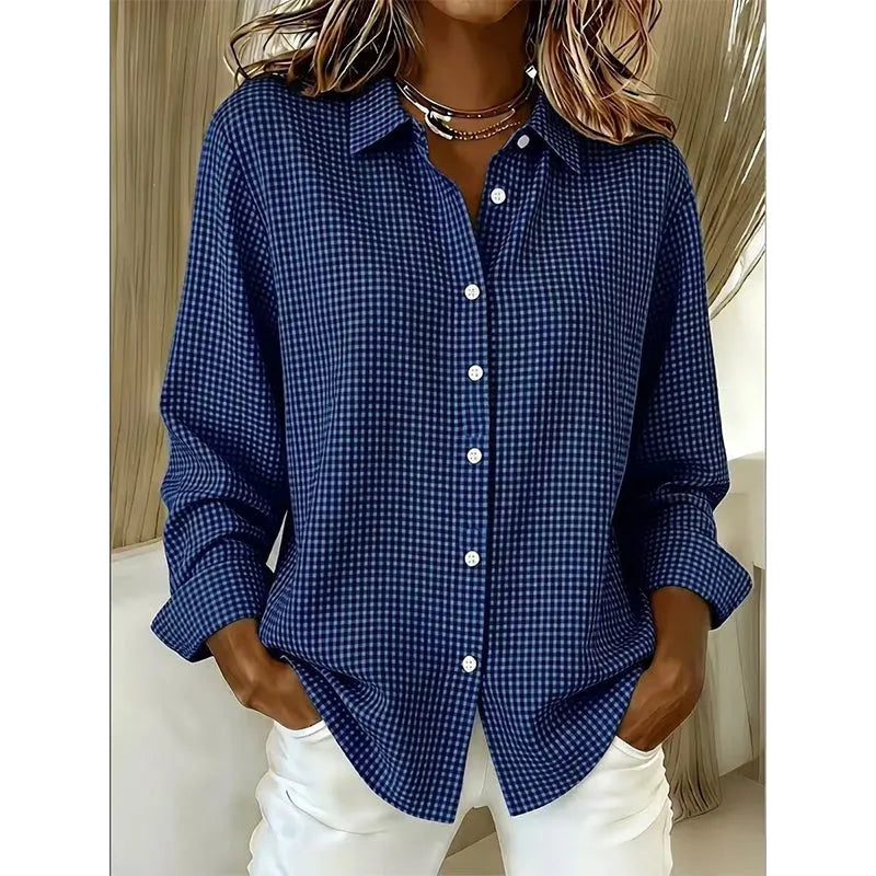 Flat lay styling of women's gingham button-up shirt with accessories