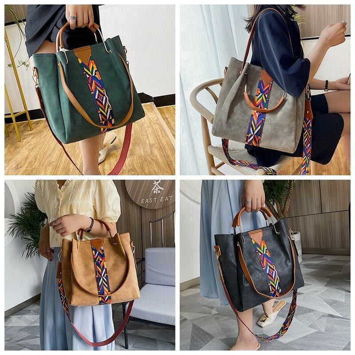 Grey everyday bag showcasing wide opening and roomy interior