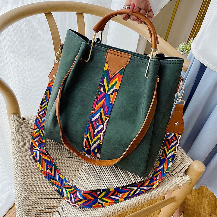 Green women's everyday carry tote bag with colorful strap