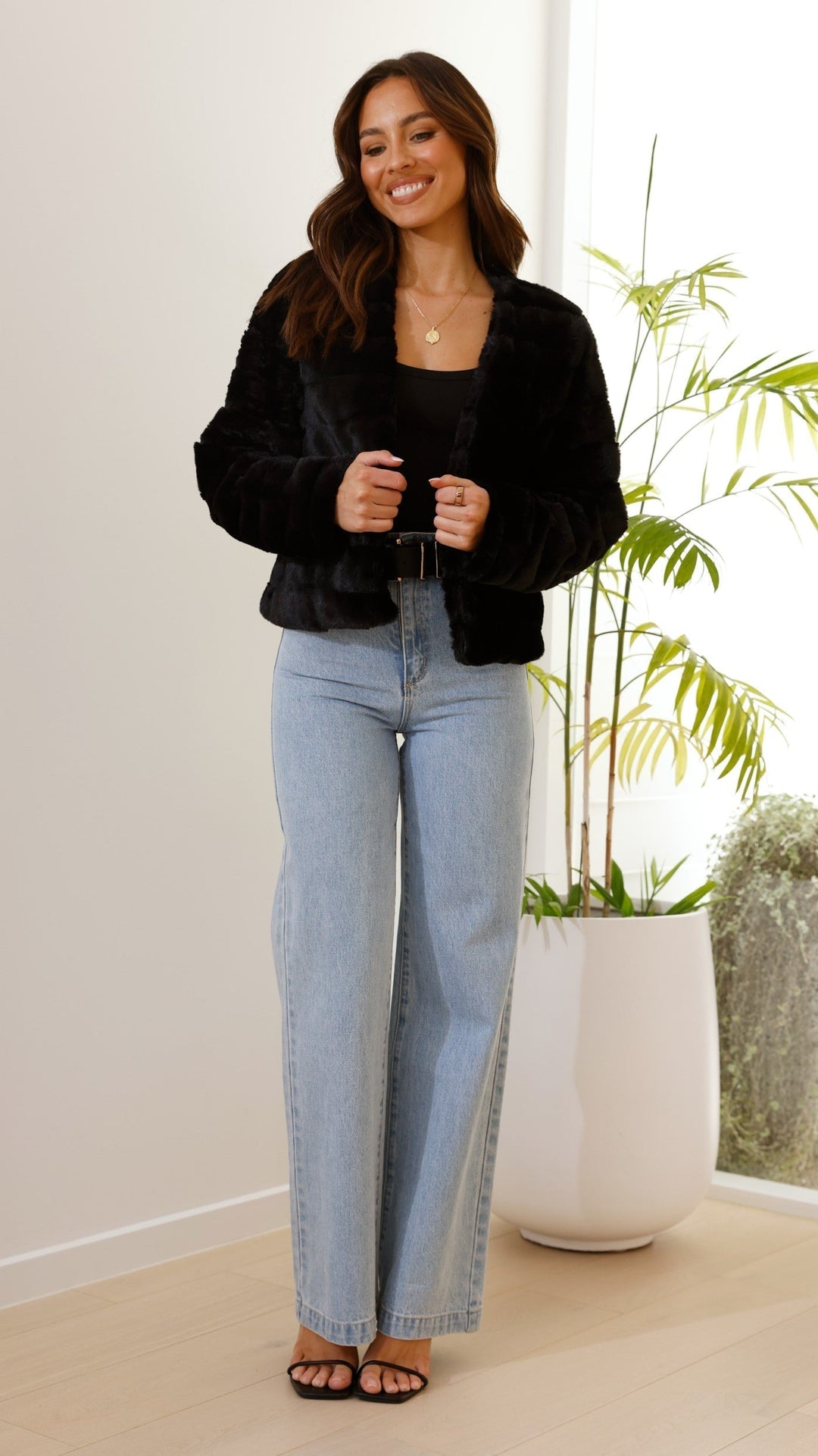 Close-up of grey cropped texture jacket fabric highlighting rich texture