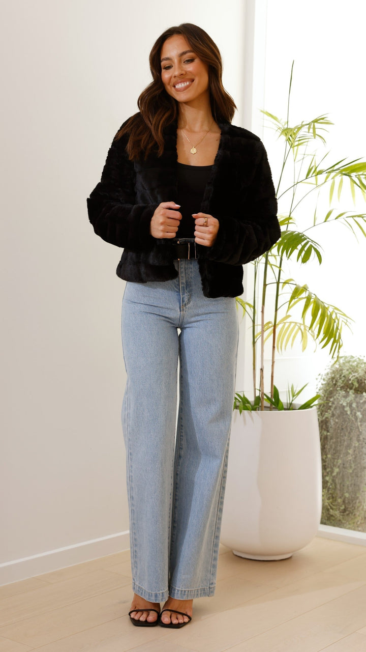 Close-up of grey cropped texture jacket fabric highlighting rich texture