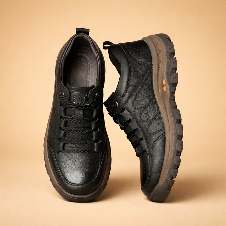 Top and side view of black men's casual walking shoes displaying textured finish