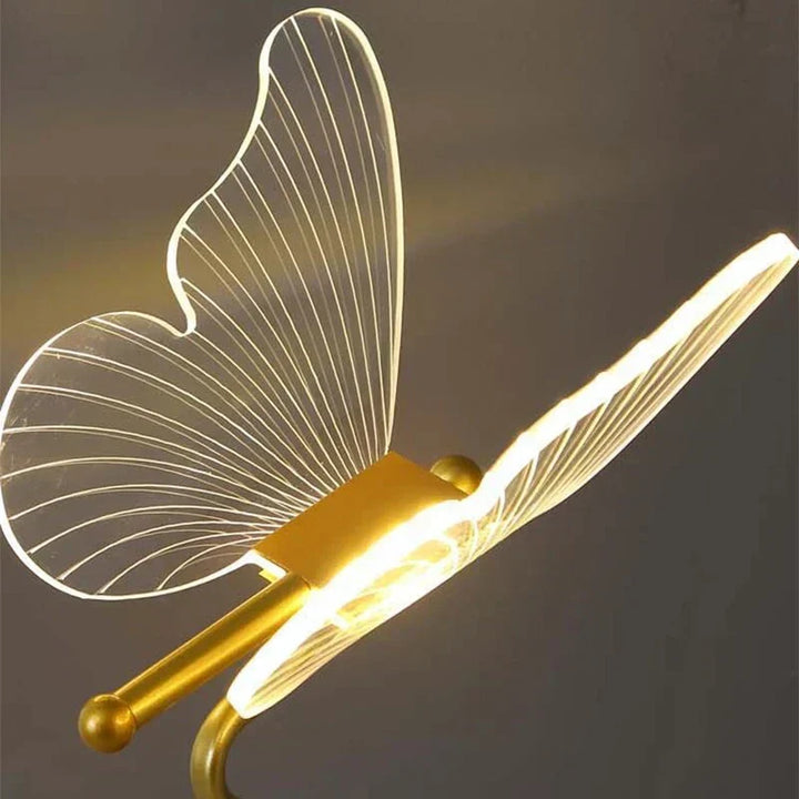 Contemporary decorative table lamp with glowing butterfly wings for modern homes