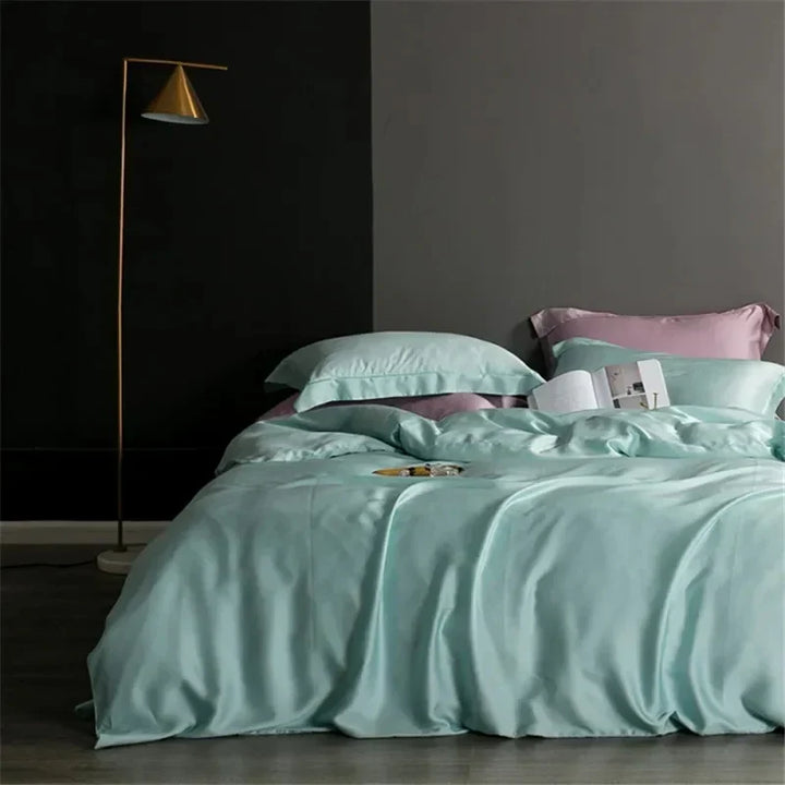 Folded luxury silk duvet cover displaying high quality natural fabric weave