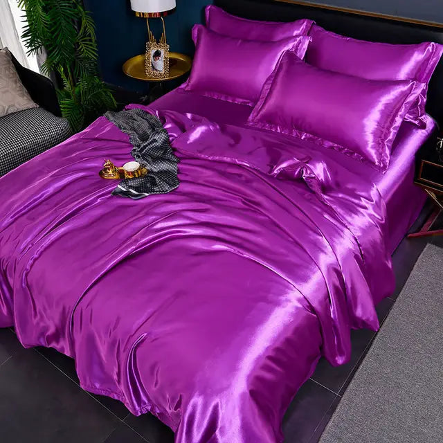 Luxury satin duvet cover set folded neatly showcasing smooth silk feel fabric