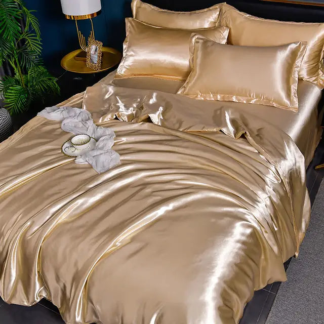 Breathable silk-feel bedding set draped softly over a contemporary bed frame