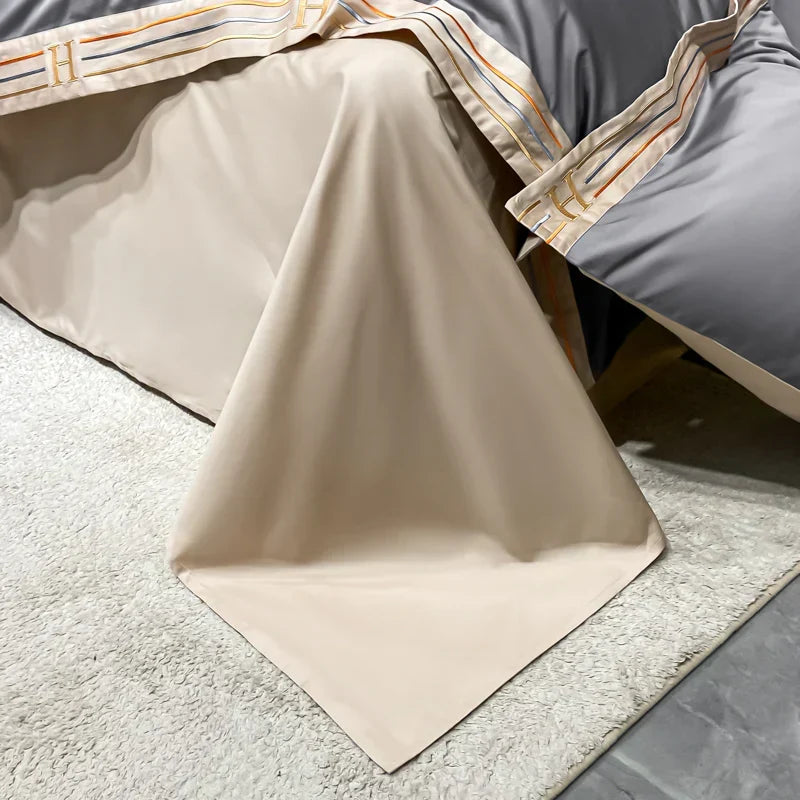 Detailed texture shot of premium four piece satin bedding set