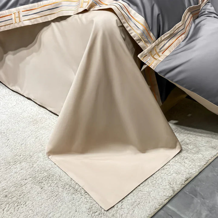 Detailed texture shot of premium four piece satin bedding set