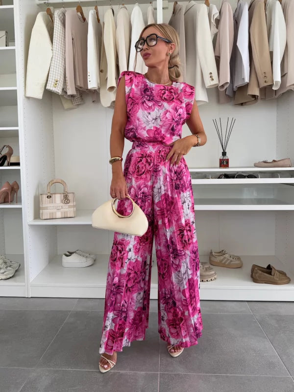 Model walking in casual summer wear matching top and wide leg trousers