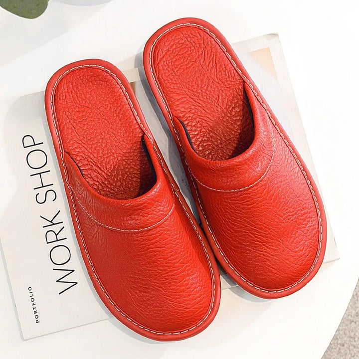 Lifestyle shot of mens ergonomic clogs resting on wooden flooring