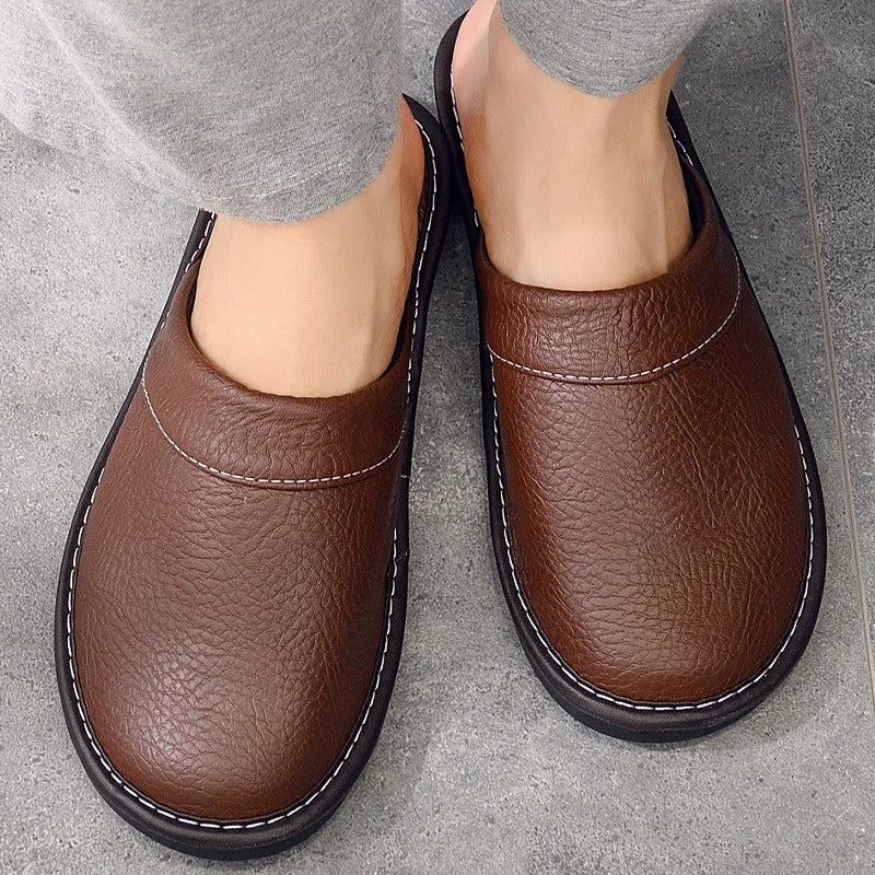 Mens ergonomic comfort slippers in classic neutral colorway, front angle view