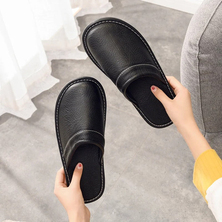 Close up of mens slip on slippers highlighting durable traction outsole