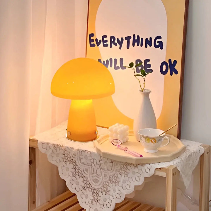 Nordic LED mushroom table lamp in bright orange casting warm ambient mood light