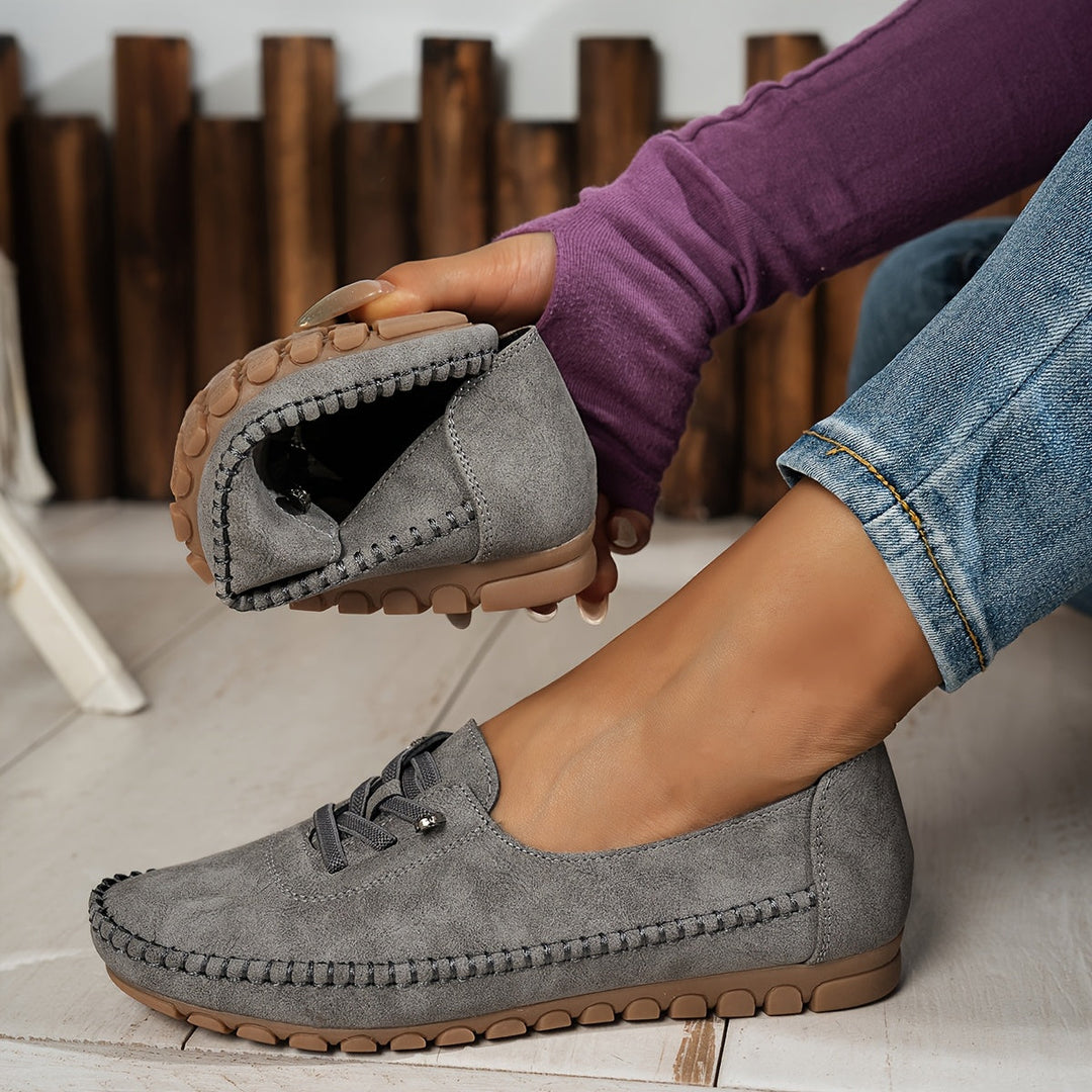 Top view of women walking shoes showing breathable fabric pattern
