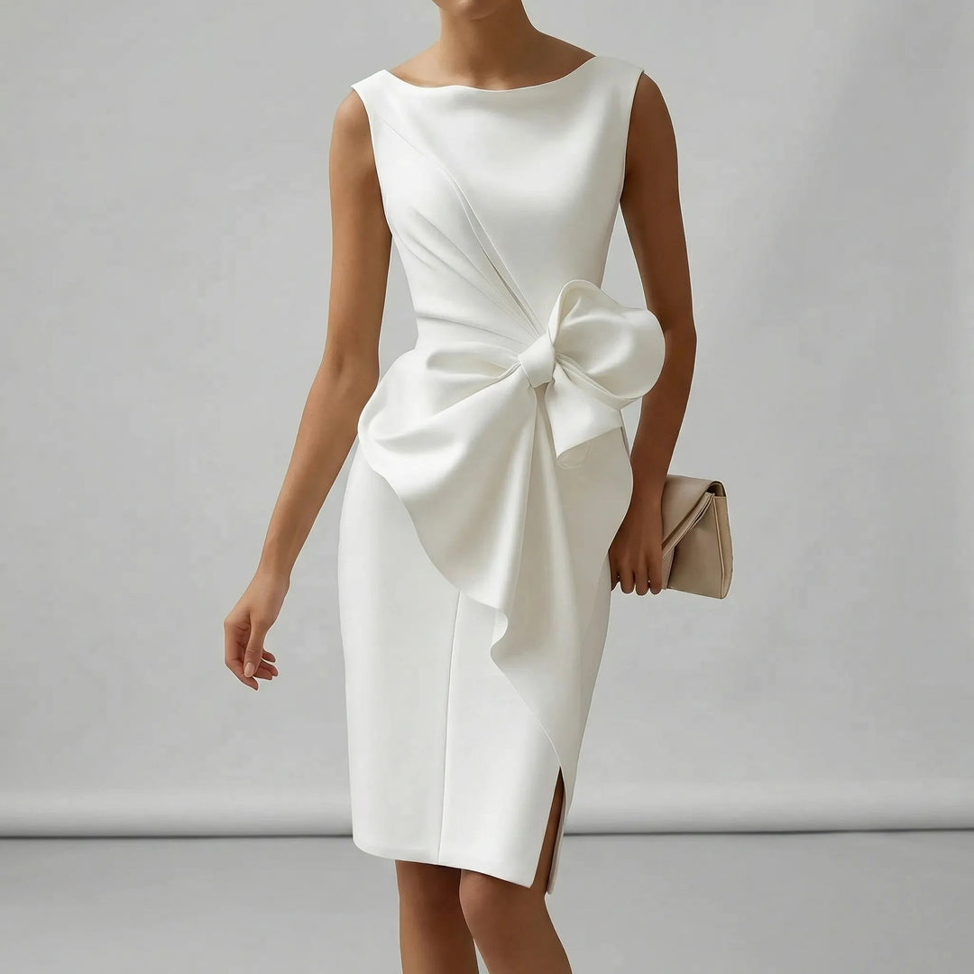Back view of the timeless bow detail midi dress, perfect as a wedding guest outfit